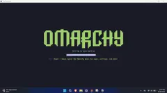 The Omarchy desktop inside the Try Omarchy window: a purple sunset wallpaper with Update System and Learn Keybindings notices in the top right.