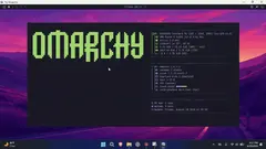 The Omarchy desktop inside the Try Omarchy window: a purple sunset wallpaper with Update System and Learn Keybindings notices in the top right.
